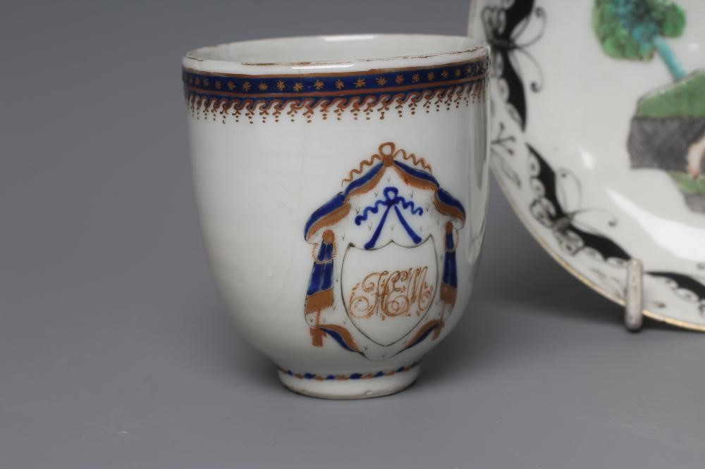 A CHINESE PORCELAIN EUROPEAN SUBJECT SAUCER painted in iron red Image