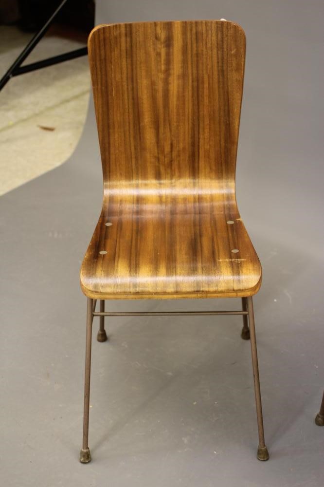 NEIL MORRIS FOR H. MORRIS & CO. GLASGOW, a pair of plywood "Toby" chairs, 1950's, with coated steel Image