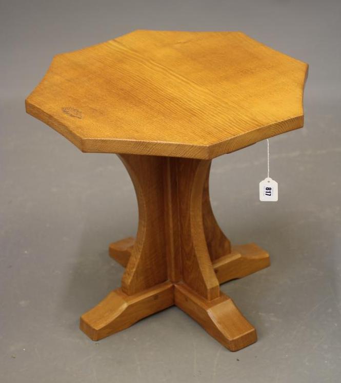 DAVID LANGSTAFF, AN ADZED OAK COFFEE TABLE, the concave sided octagonal top on waisted cruciform Image