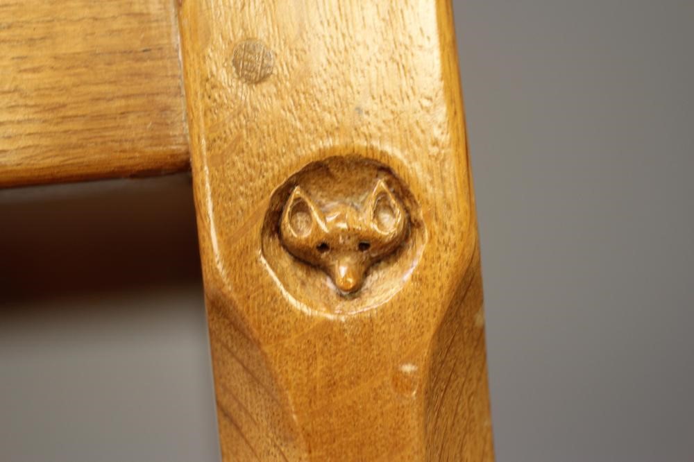 MALCOLM PIPES, AN ADZED OAK TEA TROLLEY of oblong two tier form raised on four square turned faceted Image