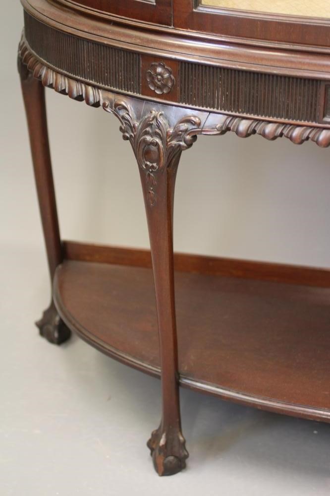 A MAHOGANY DISPLAY CABINET of bowed form Image