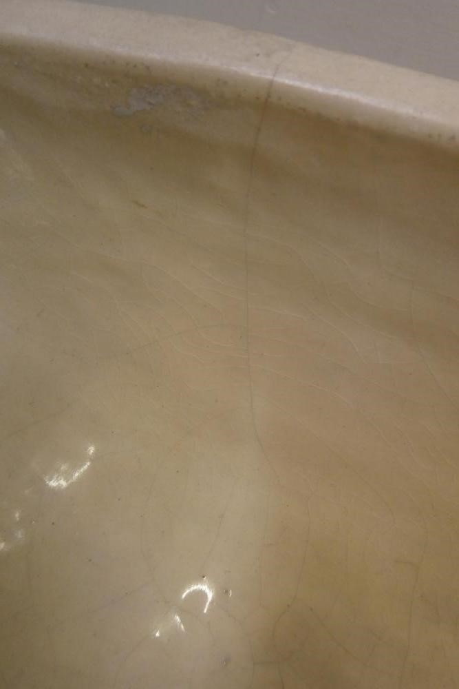 CONSTANCE SPRY (1886-1960) / CHARLES WEST for Fulham Pottery - an unglazed buff earthenware oval Image