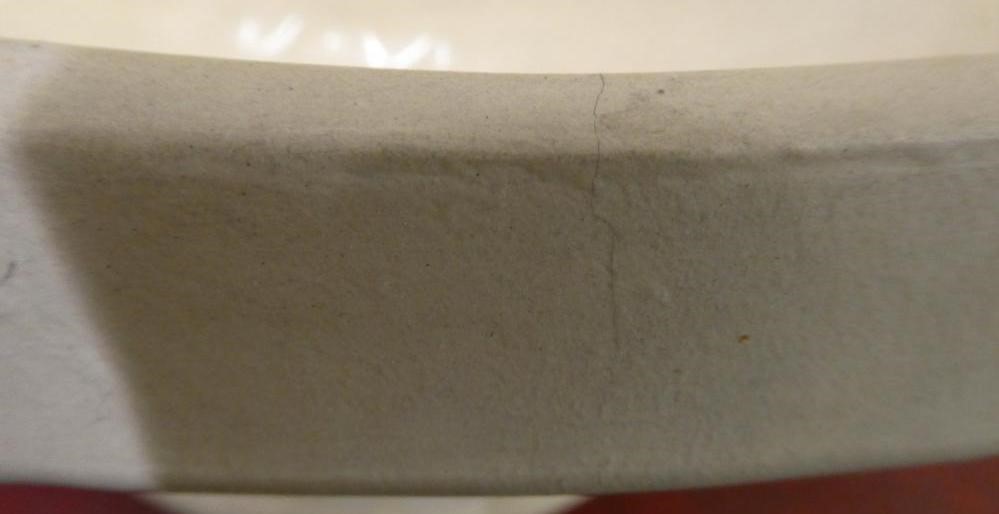 CONSTANCE SPRY (1886-1960) / CHARLES WEST for Fulham Pottery - an unglazed buff earthenware oval Image