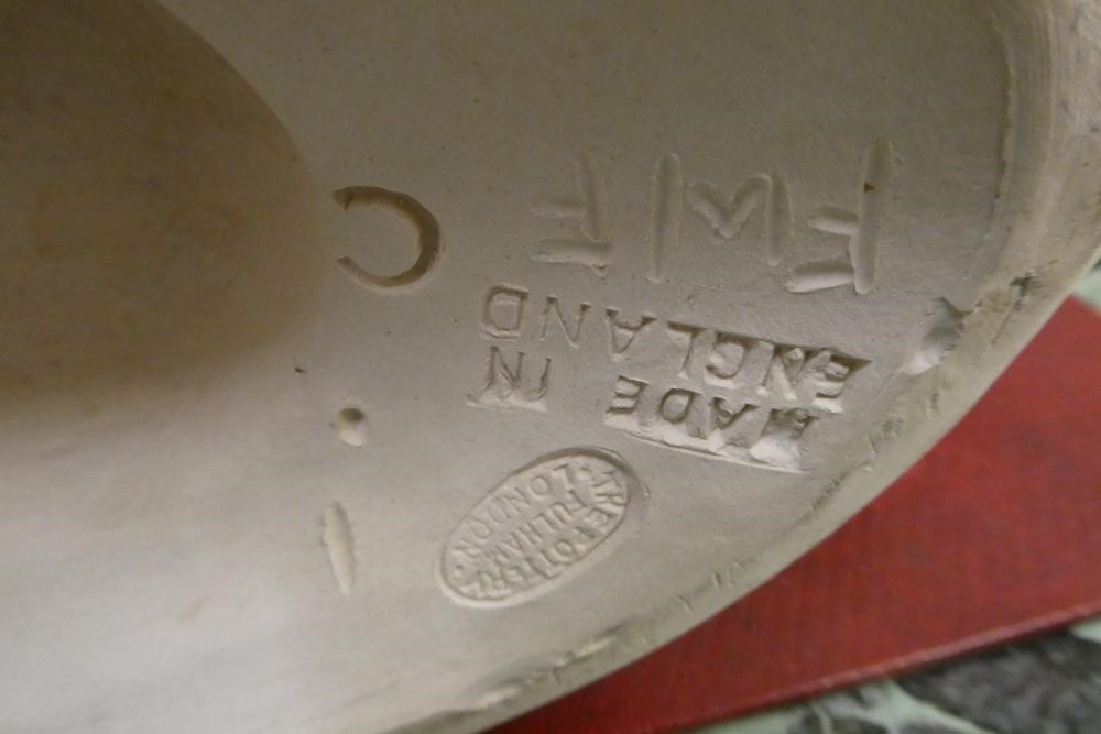 CONSTANCE SPRY (1886-1960) / CHARLES WEST for Fulham Pottery - an unglazed buff earthenware oval Image