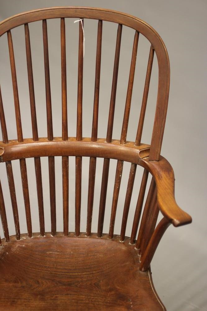 A HIGH STICK BACK WINDSOR ARMCHAIR Image