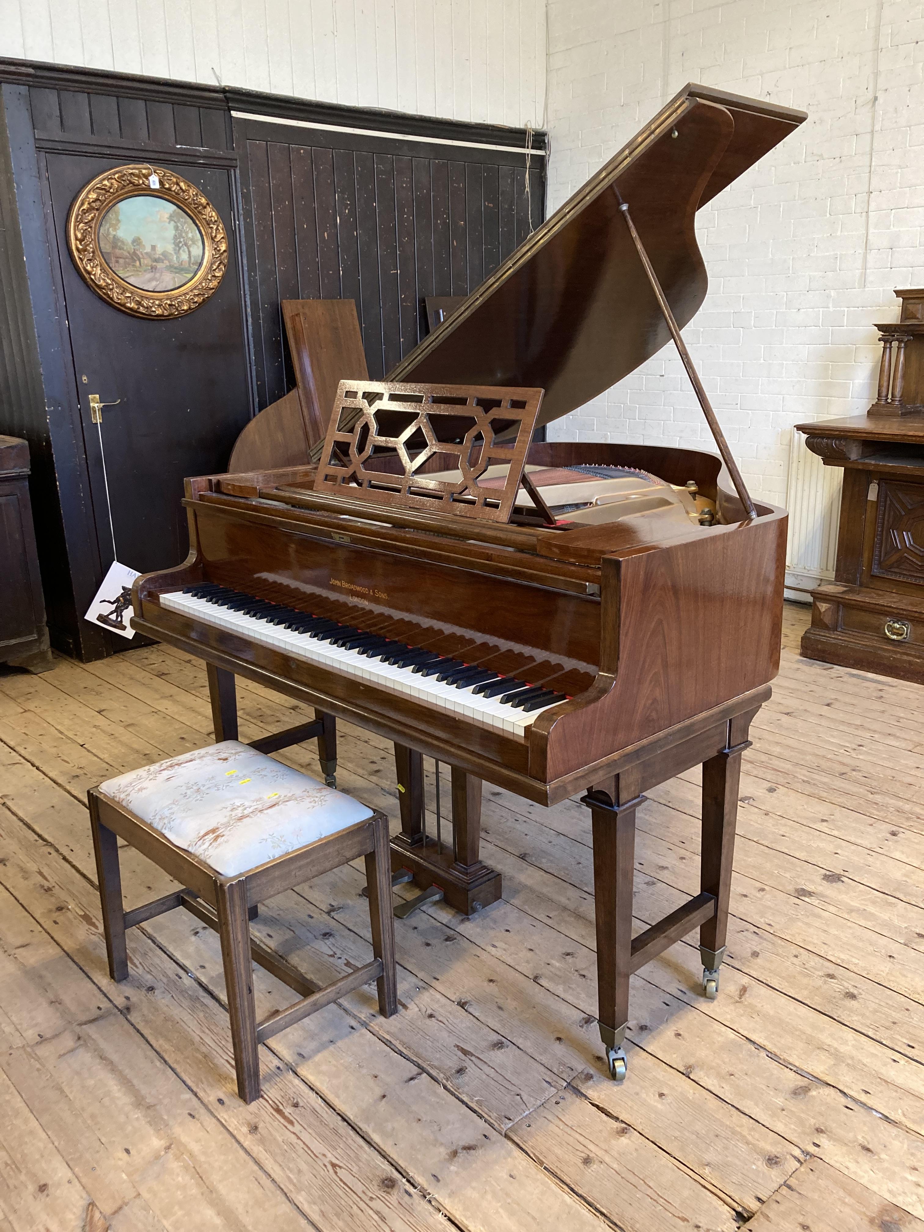 A JOHN BROADWOOD & SONS BABY GRAND PIANO in mahogany case with Chinese fret music stand Image