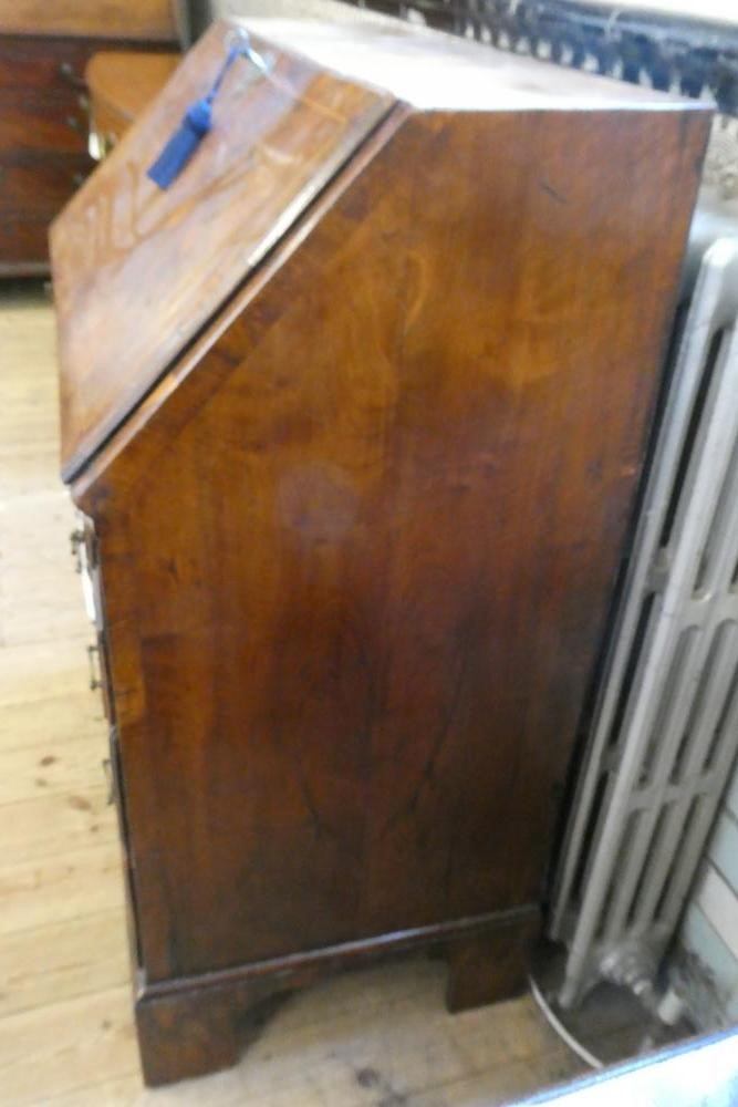 A GEORGIAN WALNUT BUREAU Image