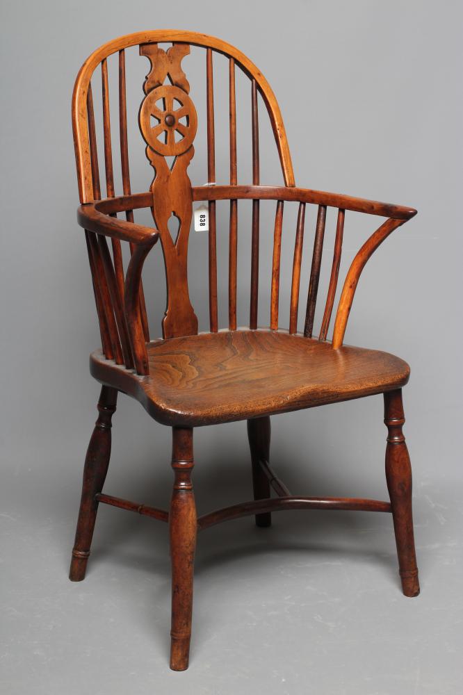 A YEW AND ELM LOW HOOP BACK WINDSOR ARMCHAIR Image