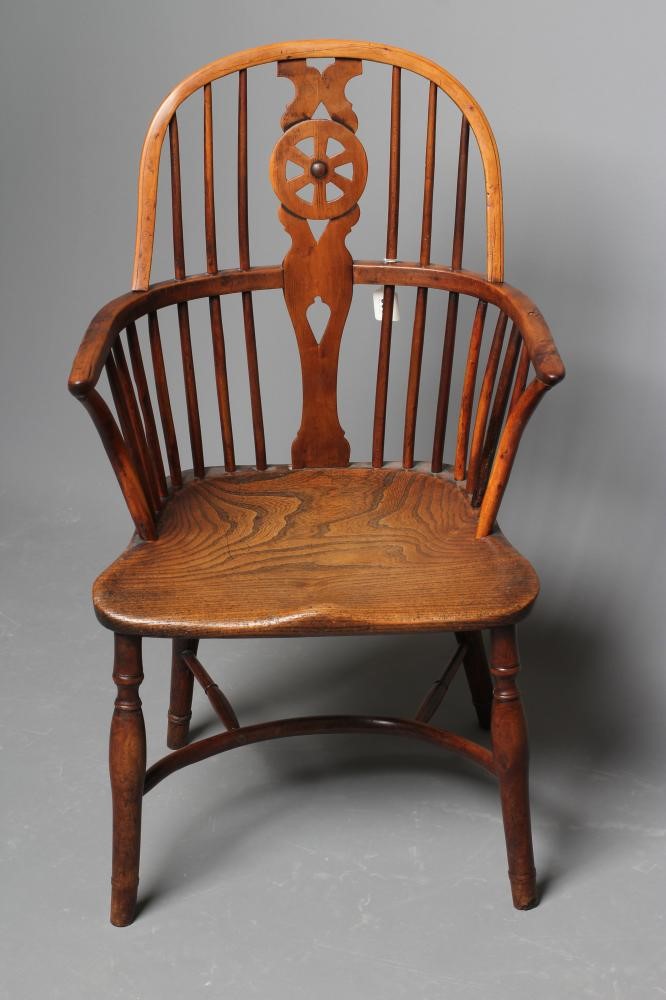 A YEW AND ELM LOW HOOP BACK WINDSOR ARMCHAIR Image