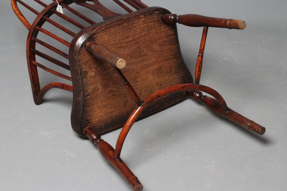 A YEW AND ELM LOW HOOP BACK WINDSOR ARMCHAIR Image
