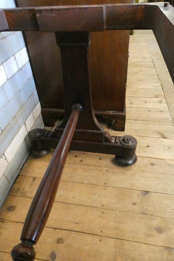 AN ARTS AND CRAFTS EBONISED RUSH SEATED STOOL Image
