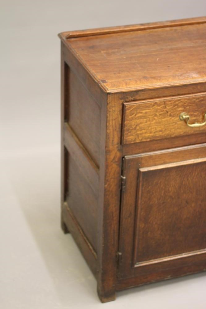 AN OAK ENCLOSED DRESSER Image