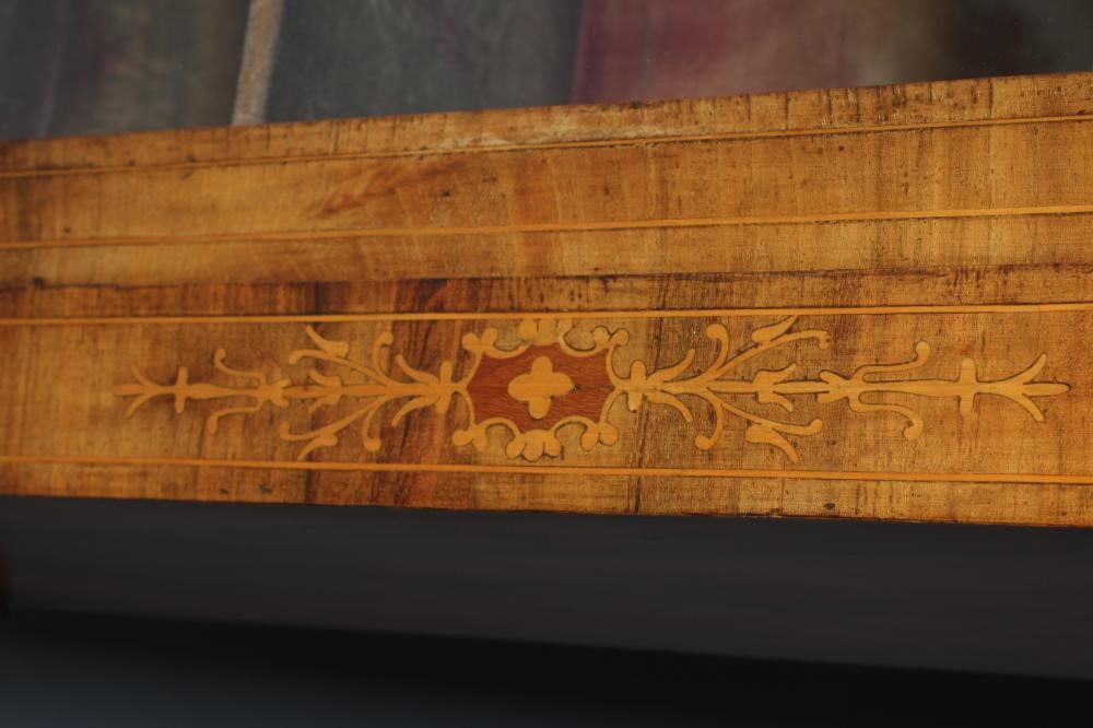 A VICTORIAN WALNUT PIER CABINET of shallow oblong form with stringing Image