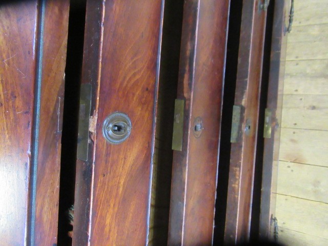 A GEORGIAN MAHOGANY BUREAU BOOKCASE Image