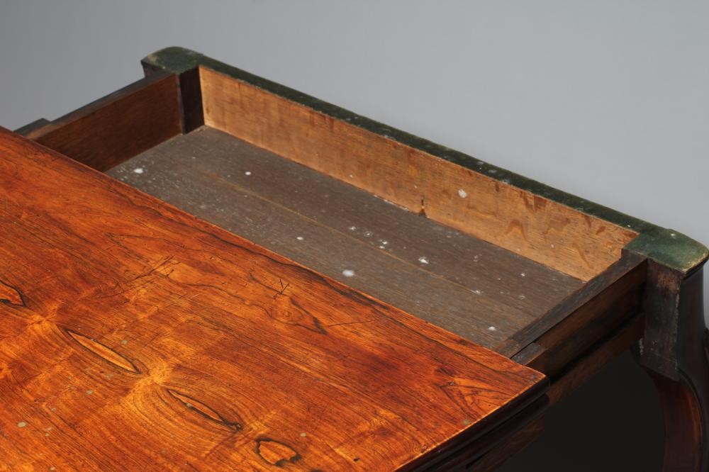 A VICTORIAN ROSEWOOD FOLDING CARD TABLE of serpentine oblong form Image
