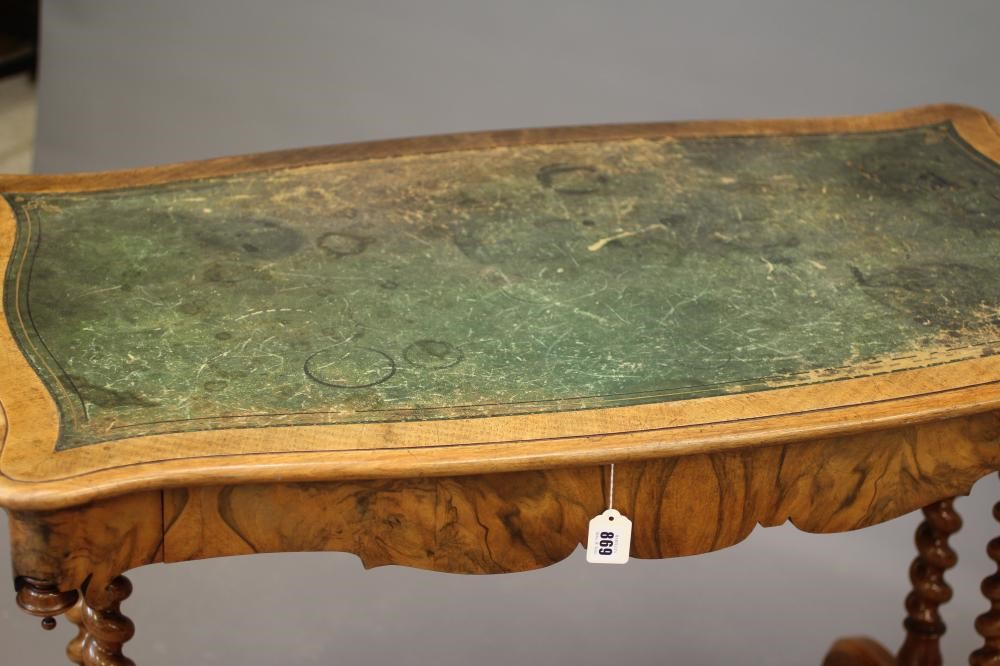 A VICTORIAN WALNUT LIBRARY TABLE Image