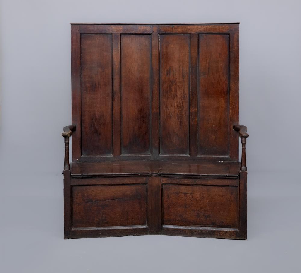 A GEORGIAN JOINED OAK PANELLED BOX SETTLE Image