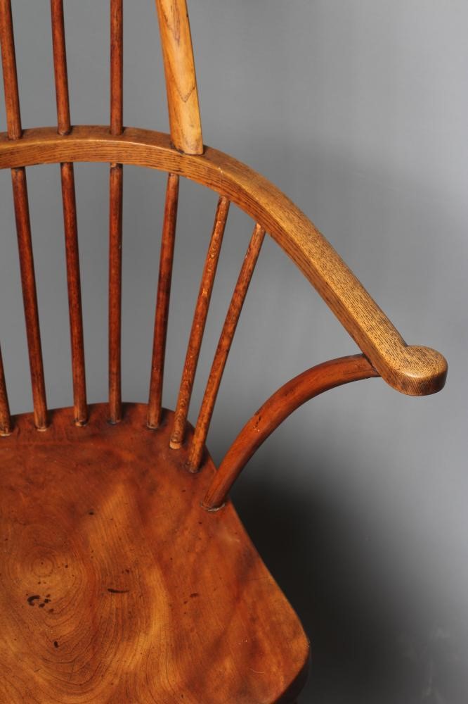 A HIGH HOOP BACK WINDSOR ARMCHAIR Image
