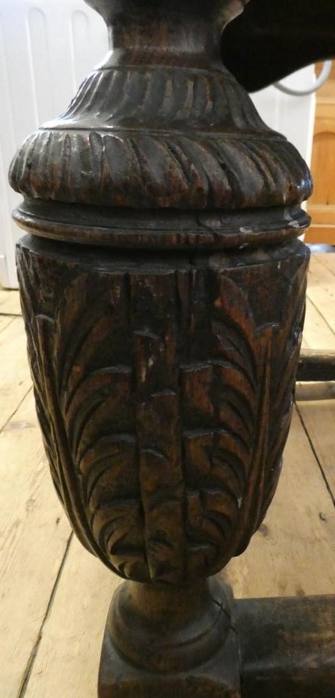 A JOINED OAK DINING TABLE Image