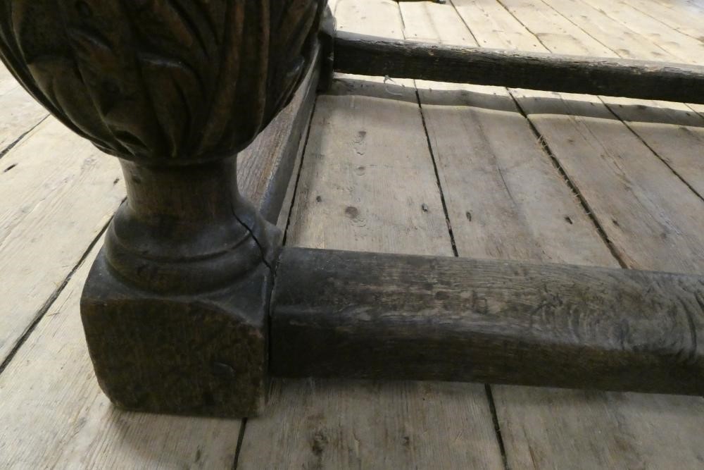 A JOINED OAK DINING TABLE Image