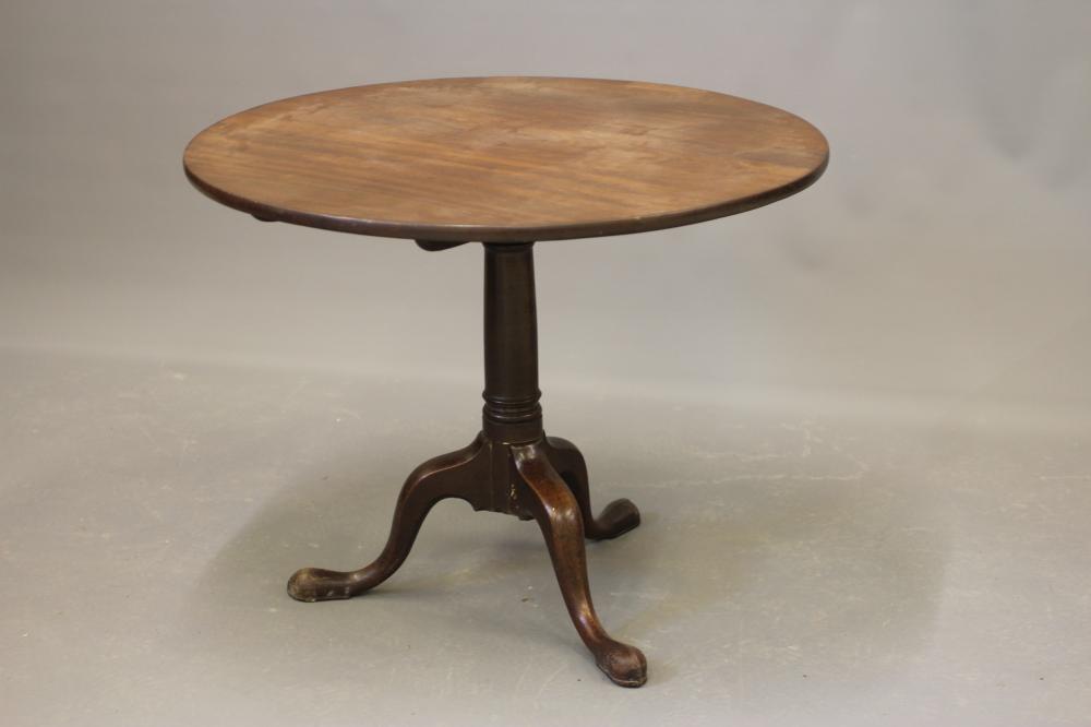 A GEORGIAN MAHOGANY TRIPOD TABLE, third quarter 18th century, the circular tilt top on turned gun Image