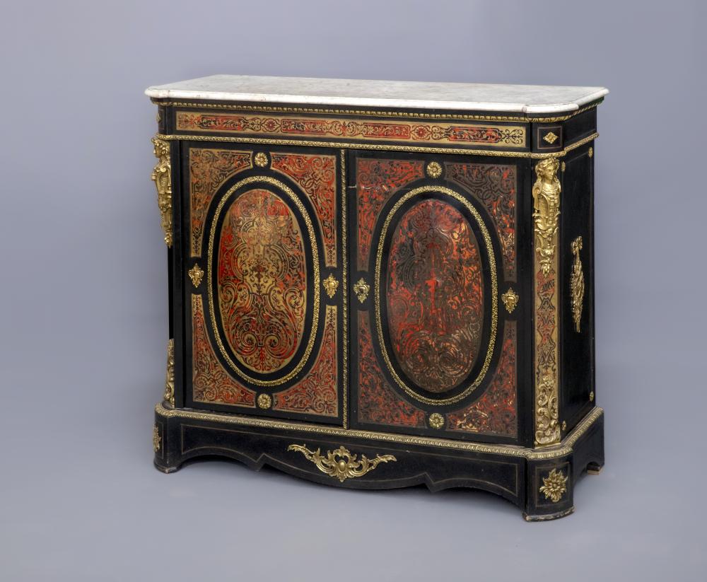 A VICTORIAN RED BOULLE AND EBONISED SIDE CABINET of shallow oblong form with gilt metal mounts Image