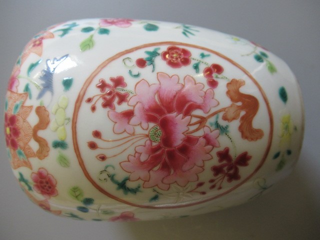 A CHINESE PORCELAIN FAMILLE ROSE JAR of ovoid form painted with roundels of peonies on a scattered Image