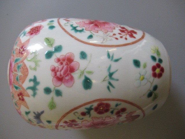 A CHINESE PORCELAIN FAMILLE ROSE JAR of ovoid form painted with roundels of peonies on a scattered Image