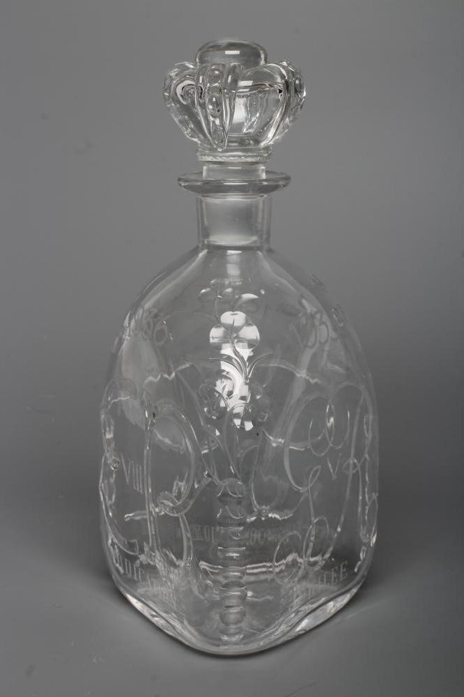 OF ROYAL INTEREST - A Stevens & Williams triangular glass decanter with crown stopper Image