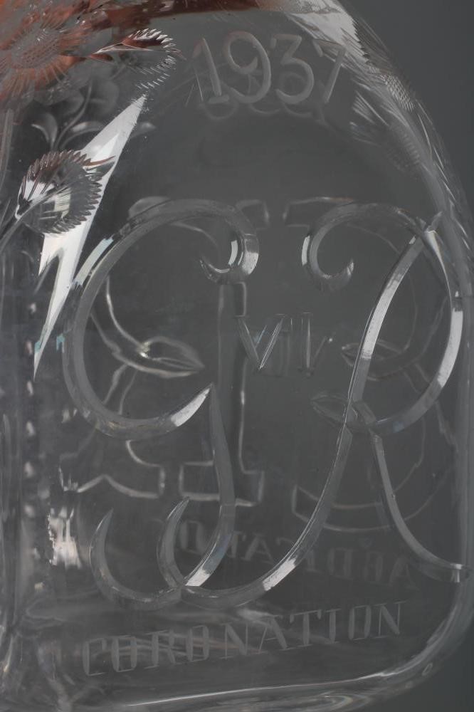 OF ROYAL INTEREST - A Stevens & Williams triangular glass decanter with crown stopper Image