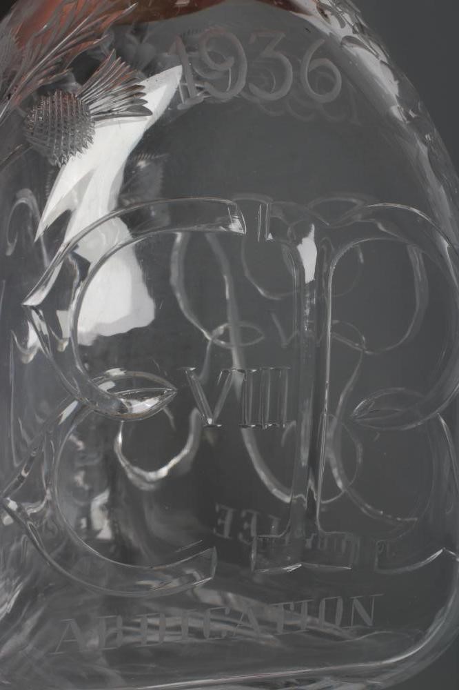 OF ROYAL INTEREST - A Stevens & Williams triangular glass decanter with crown stopper Image