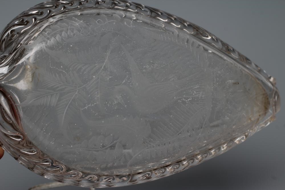 A VICTORIAN ELIPTICAL GLASS FLASK with double spout and applied prunted edge Image