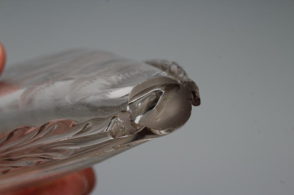 A VICTORIAN ELIPTICAL GLASS FLASK with double spout and applied prunted edge Image