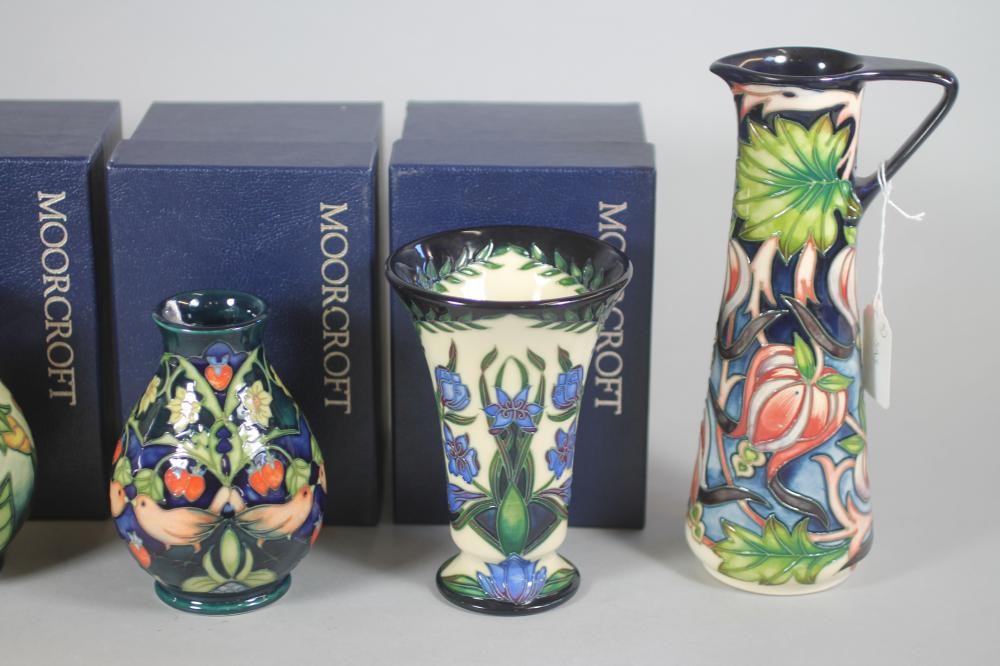 A COLLECTION OF MOORCROFT POTTERY Image