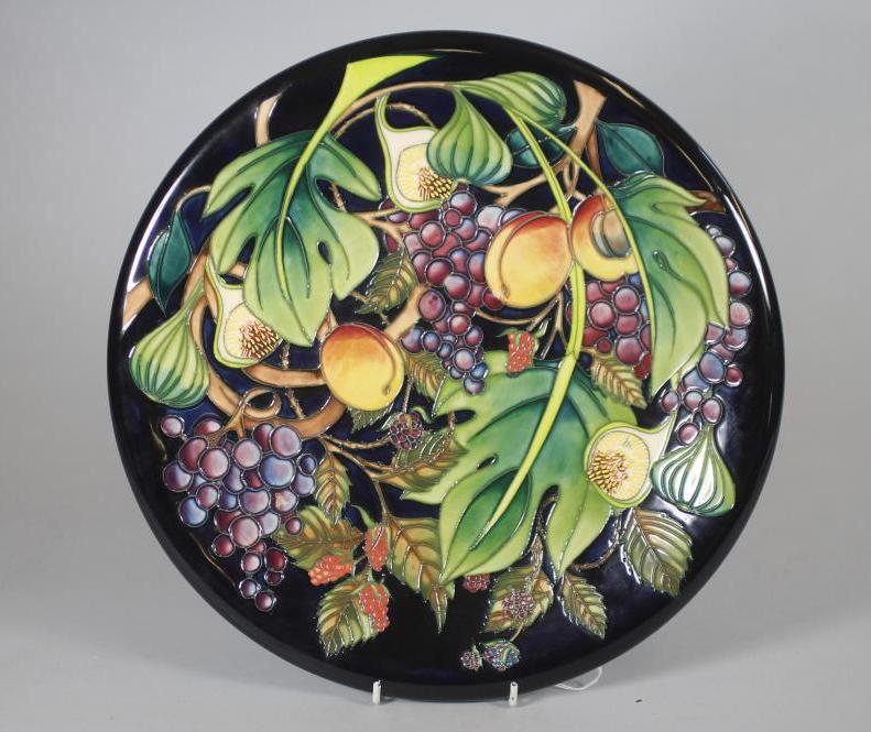 A MOORCROFT POTTERY "QUEENS CHOICE" PATTERN CHARGER Image