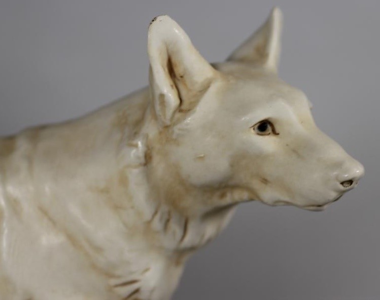 A ROYAL DUX PORCELAIN DOG GROUP modelled as two Japanese Hokkaido recumbent and standing Image