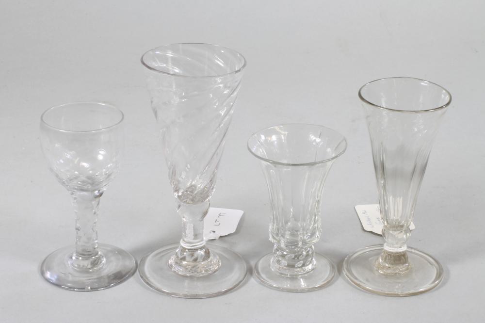 A COLLECTION OF FOUR GEORGIAN AND SLIGHTLY LATER DRINKING GLASSES comprising a panel moulded jelly Image