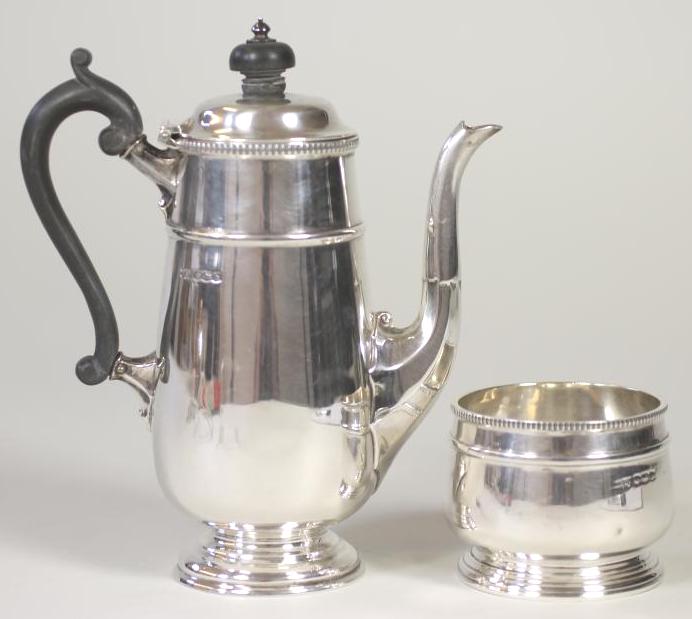 *A SILVER HOT MILK JUG AND SUGAR BASIN Image