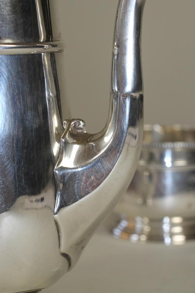 *A SILVER HOT MILK JUG AND SUGAR BASIN Image