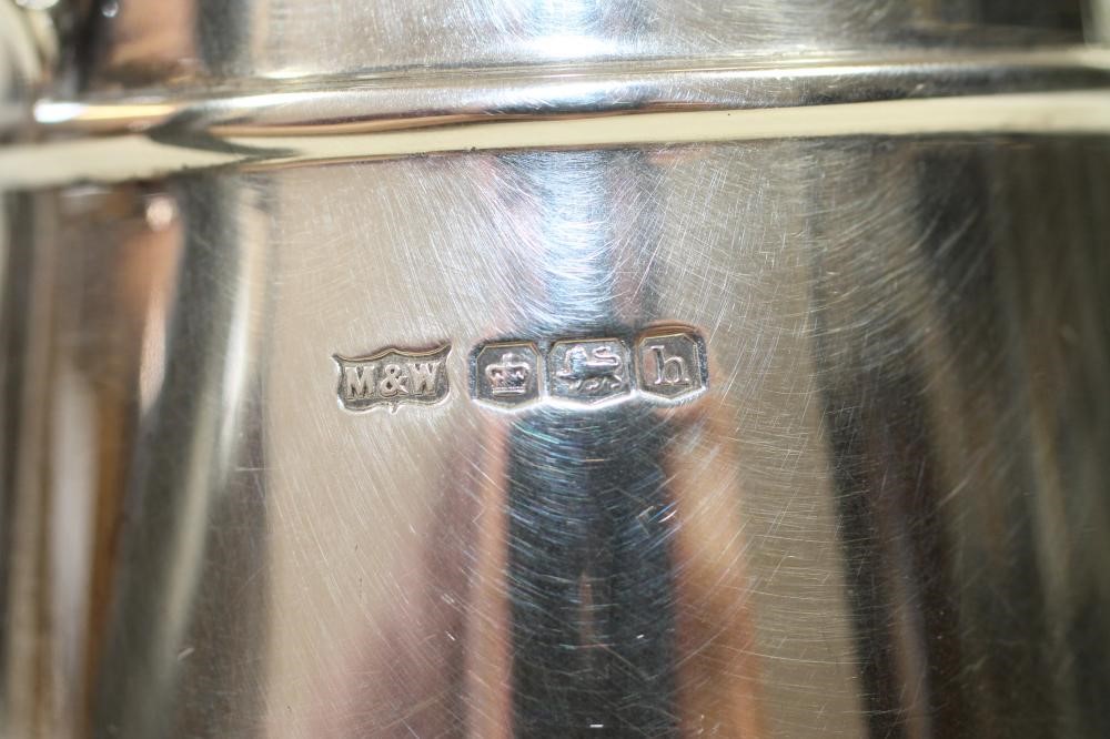 *A SILVER HOT MILK JUG AND SUGAR BASIN Image