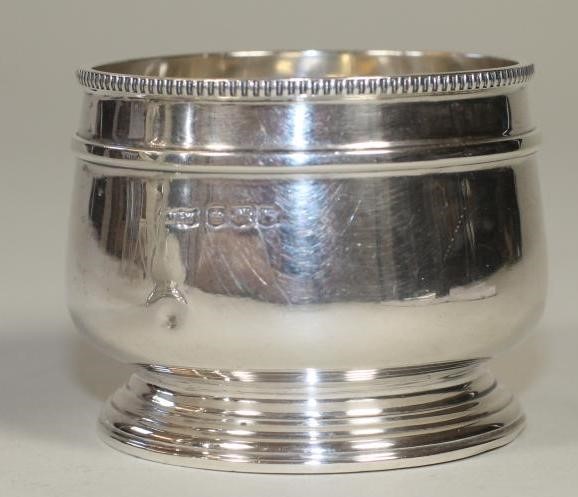 *A SILVER HOT MILK JUG AND SUGAR BASIN Image