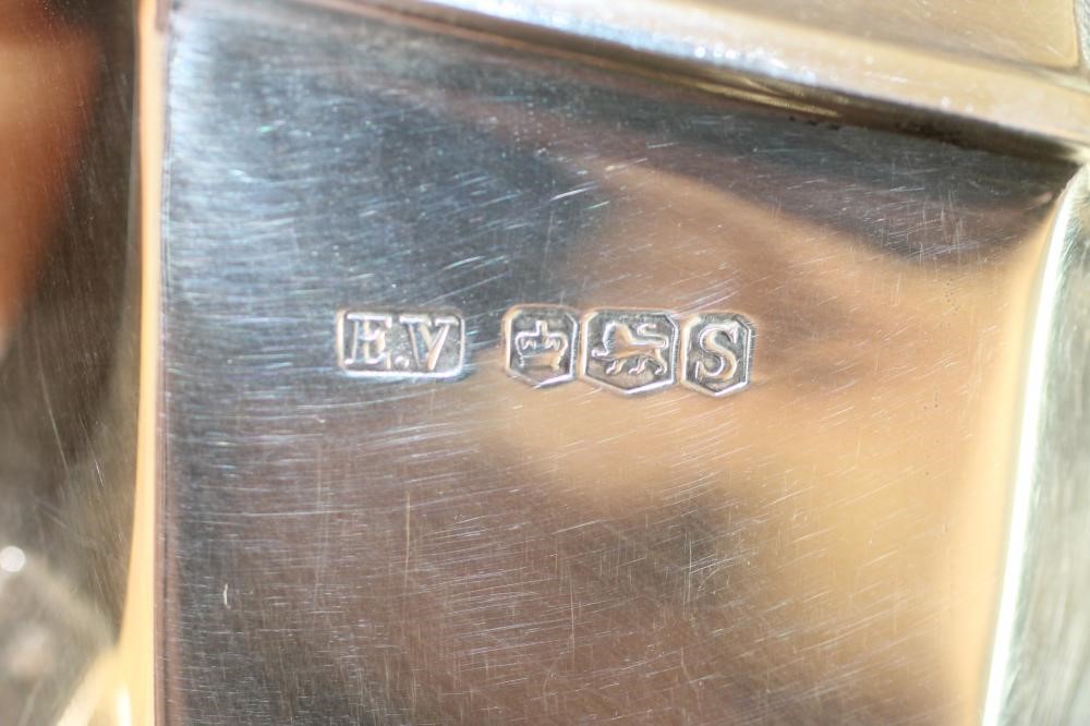 A SILVER FOUR PIECE TEA AND COFFEE SERVICE Image