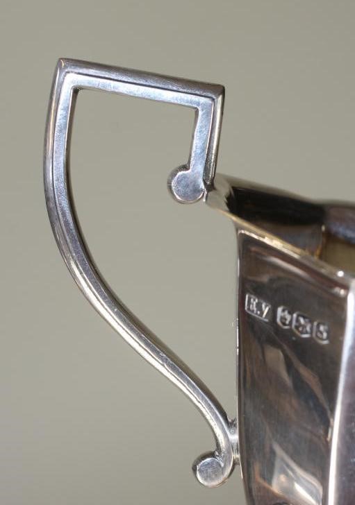 A SILVER FOUR PIECE TEA AND COFFEE SERVICE Image