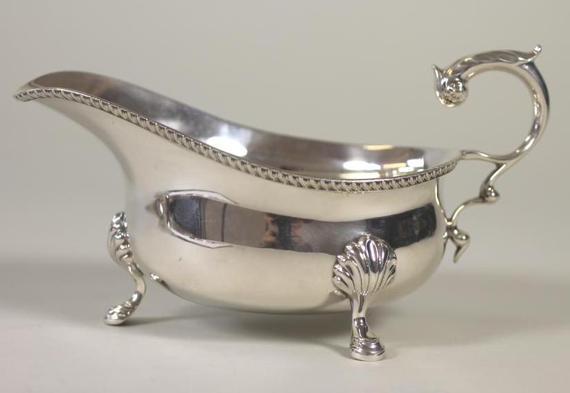 A SILVER SAUCEBOAT Image