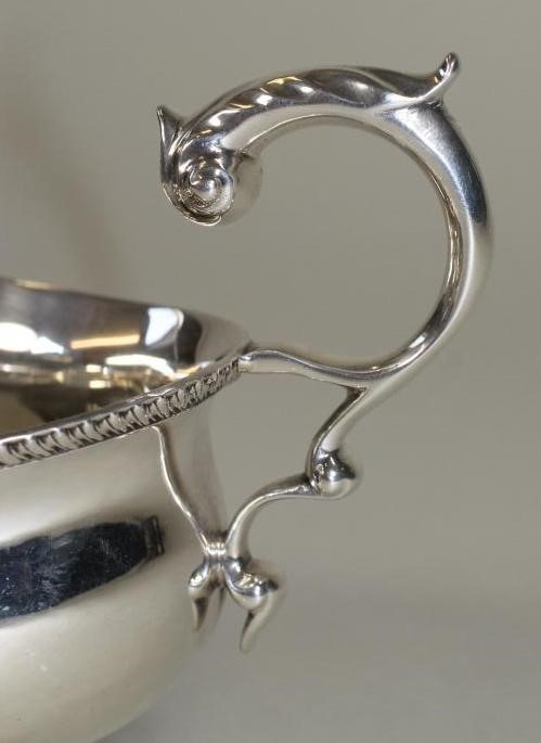 A SILVER SAUCEBOAT Image