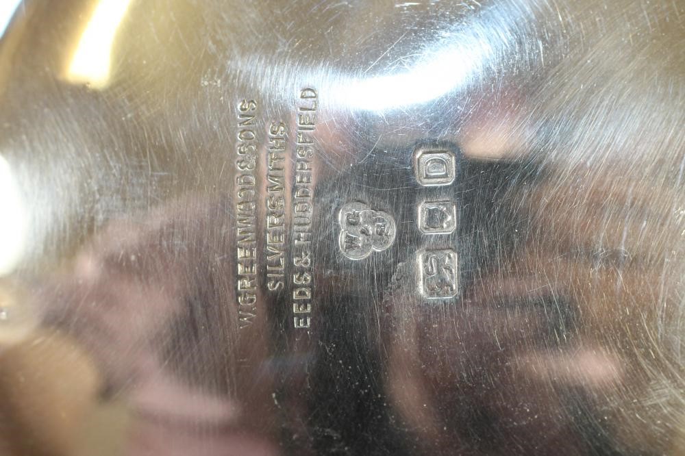 A SILVER SAUCEBOAT Image