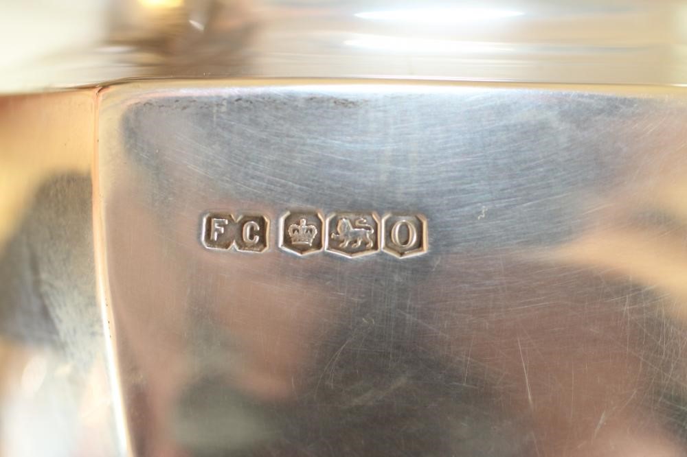 *A SILVER THREE PIECE TEA SERVICE Image