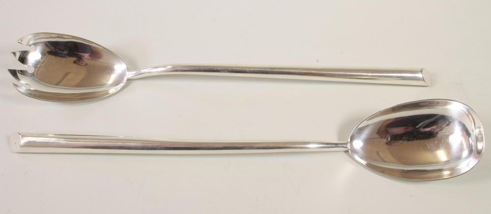 A PAIR OF SILVER SALAD SERVERS Image