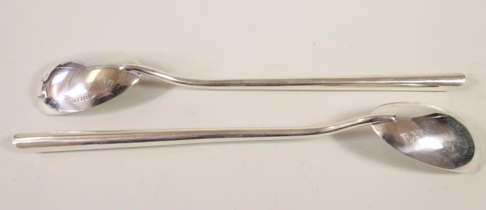A PAIR OF SILVER SALAD SERVERS Image