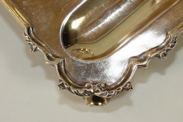 A SMALL SILVER GILT DESK STAND Image